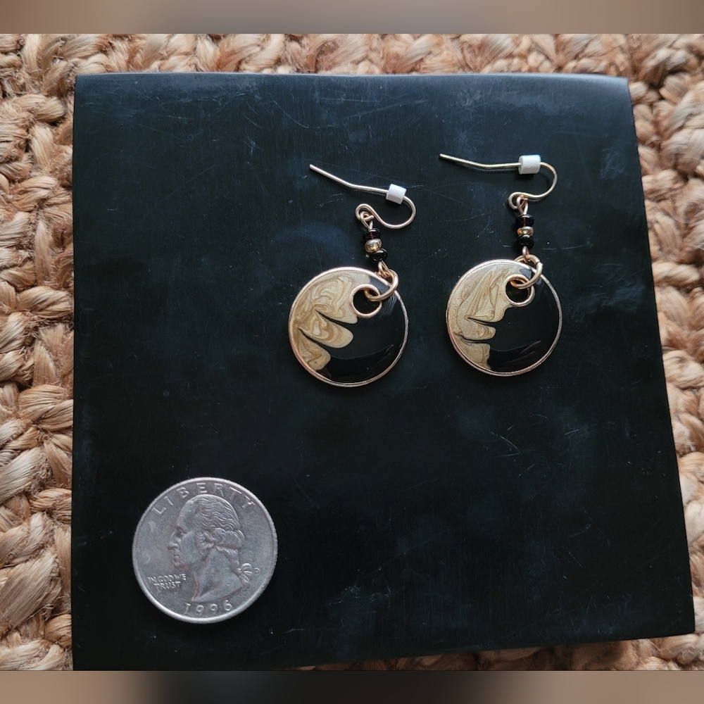 Hammered metal black and creamy gold resin earrings